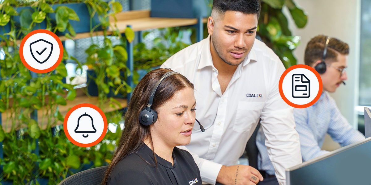 Staff from Coal LSL looking at content on a computer A man and a woman look at content on a laptop