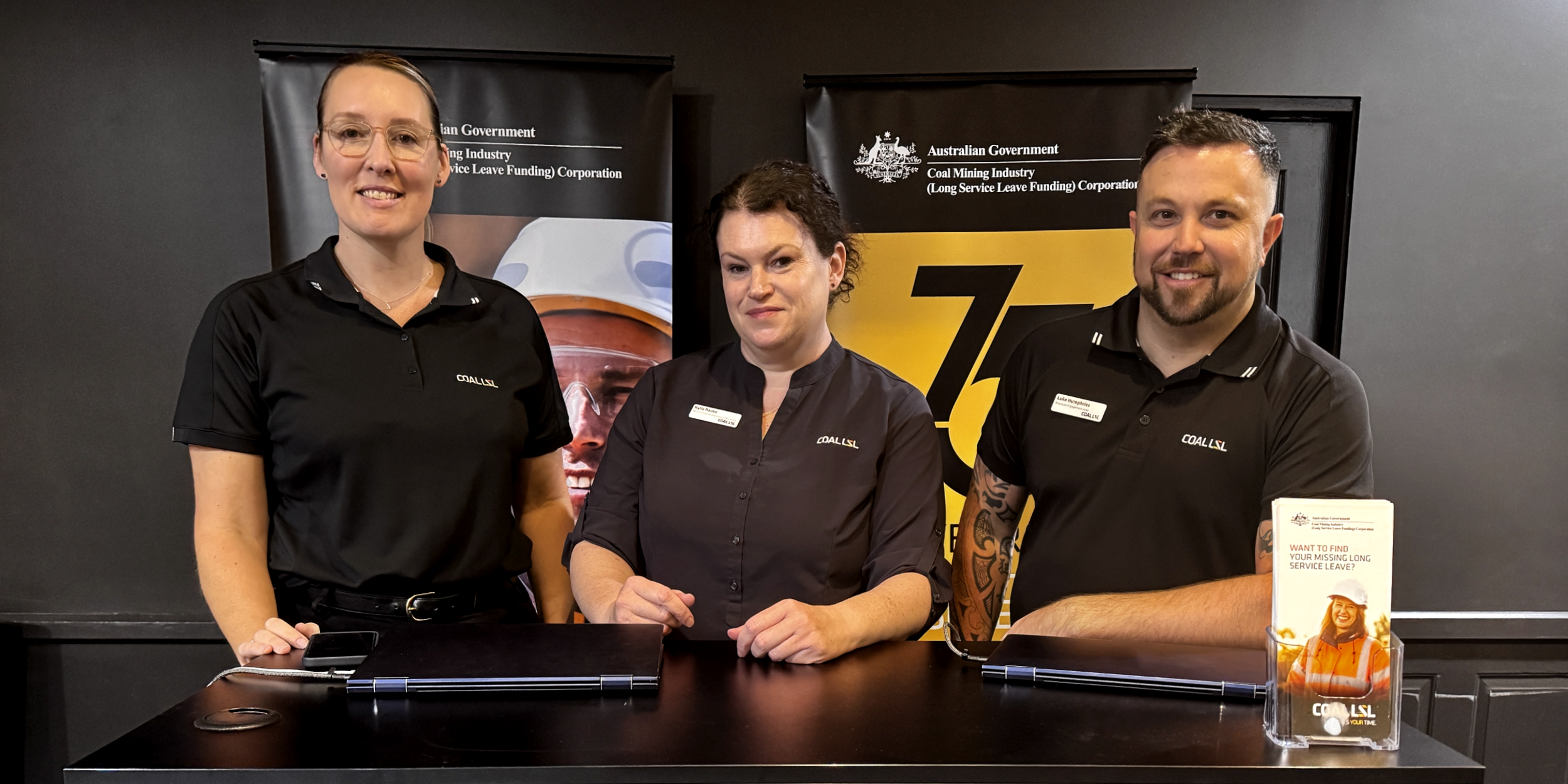 Header image for Education and Engagement team Education and Engagement team standing at a desk