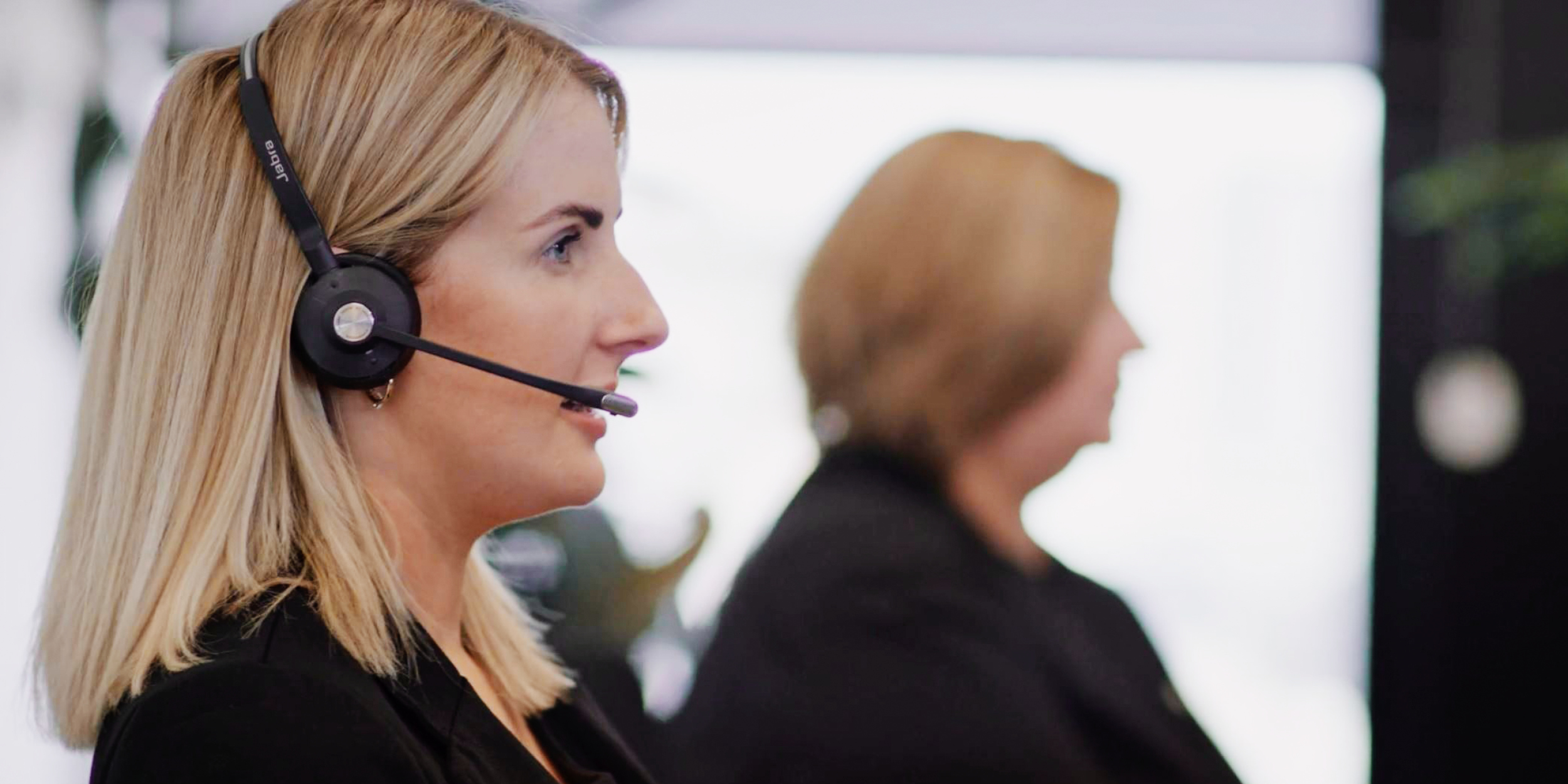 Call centre staff taking phone call